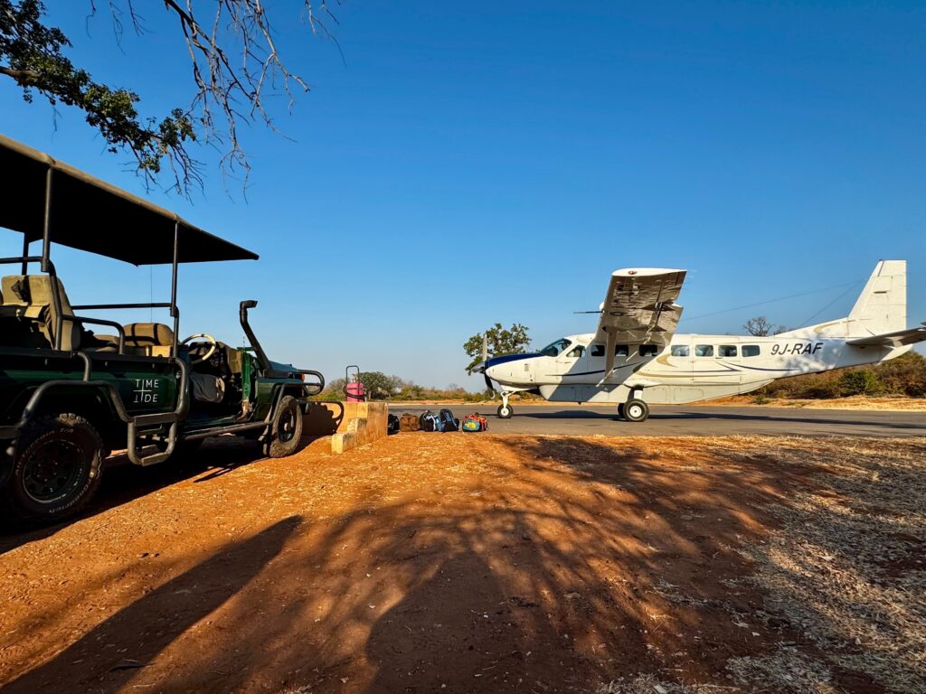 Zambia bush plane and safari truck
