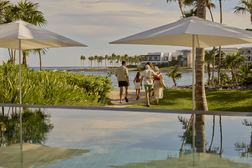 Conrad Tulum Riviera Maya family walking towards beach